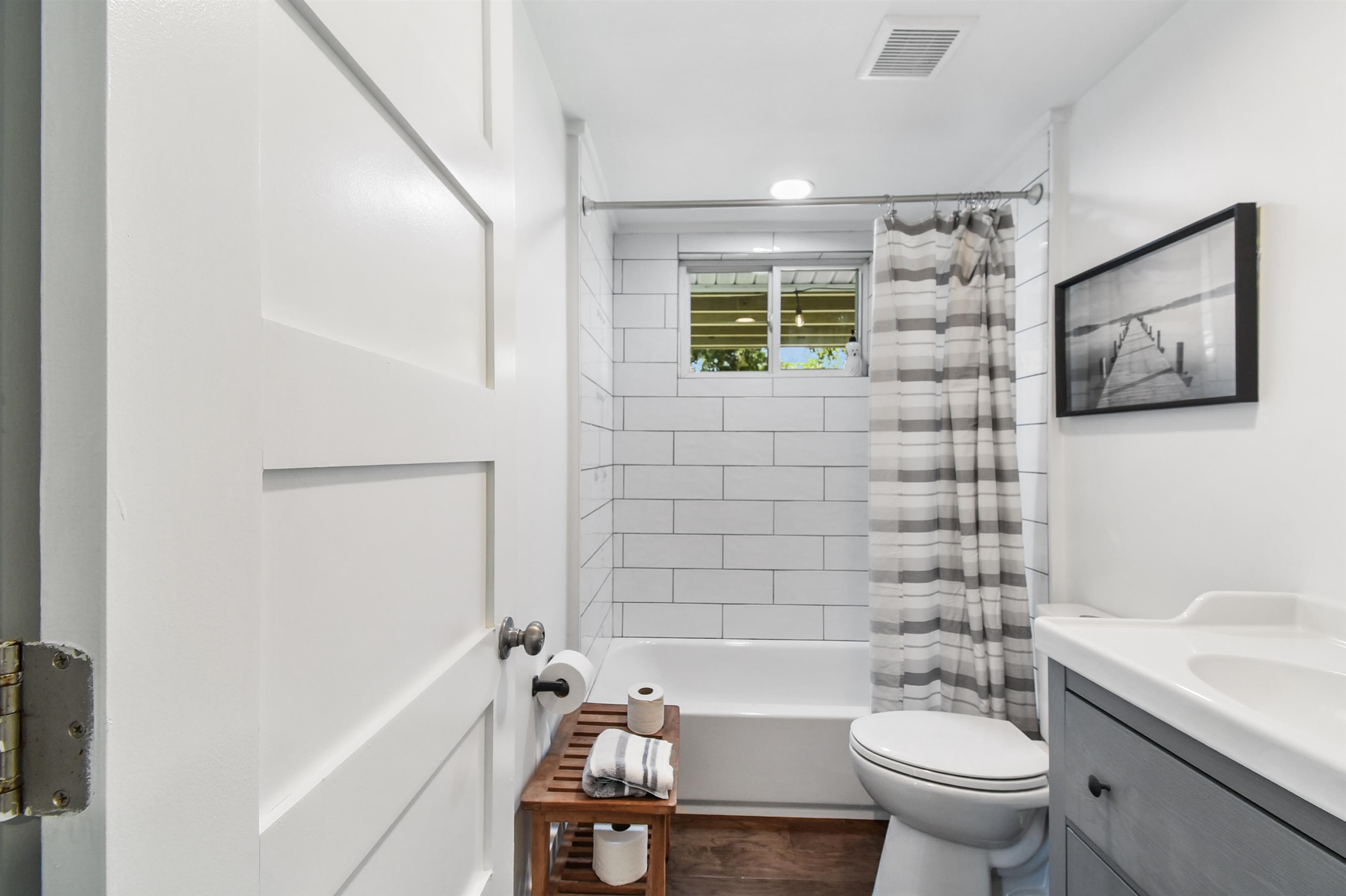 207 Spring Street St. Augustine, FL 32084 - Photo 22 of 32 a bathroom with a bathtub toilet and sink