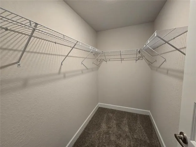 a aerial view of a house with a yard