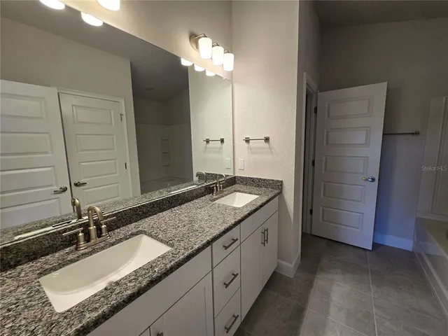 a view of a lake with a big yard