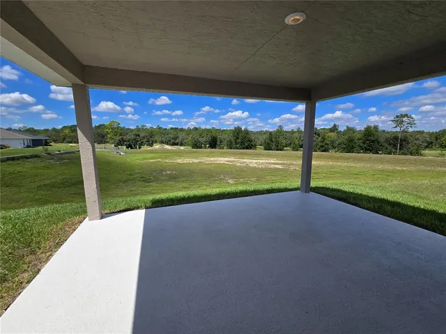 a view of an outdoor space and a lake view
