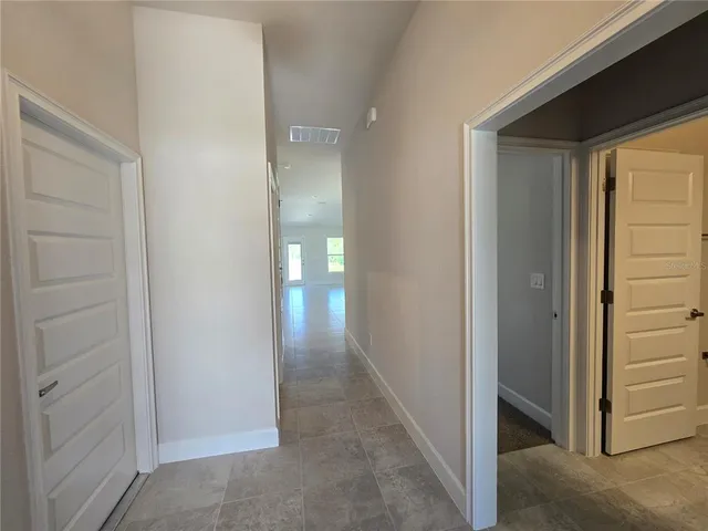 a view of a hallway with closet area
