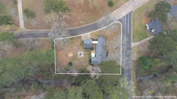 a kitchen with kitchen island a stove a sink and a refrigerator
