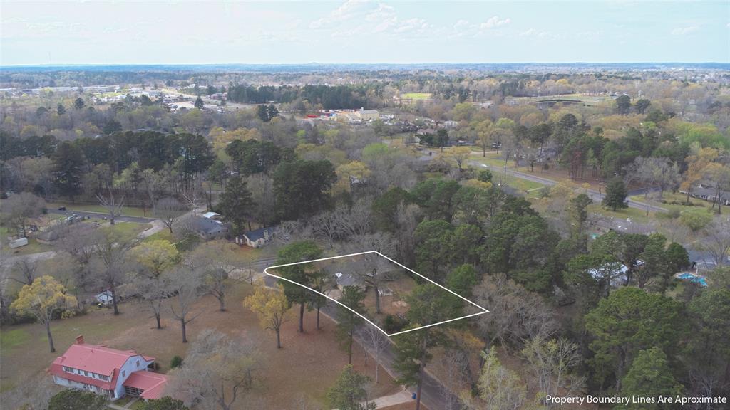2414 South Martin Street Kilgore, TX 75662 - Photo 3 of 38 an aerial view of residential house with outdoor space