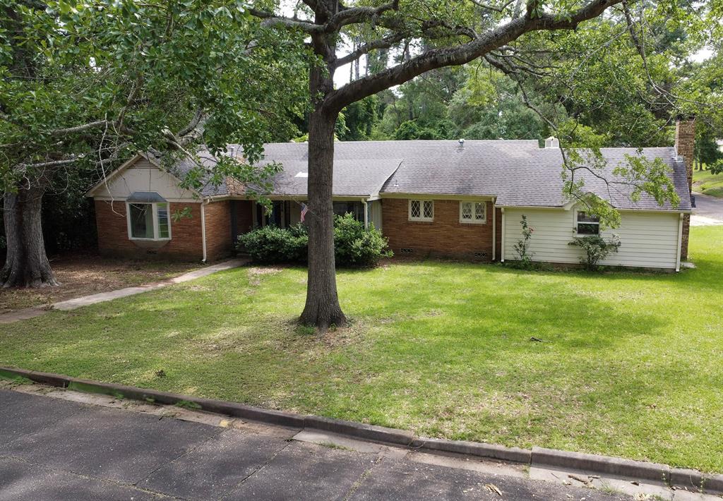 2414 South Martin Street Kilgore, TX 75662 - Photo 35 of 38 a house view with a garden space
