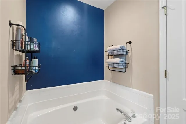 a bathroom with a bathtub