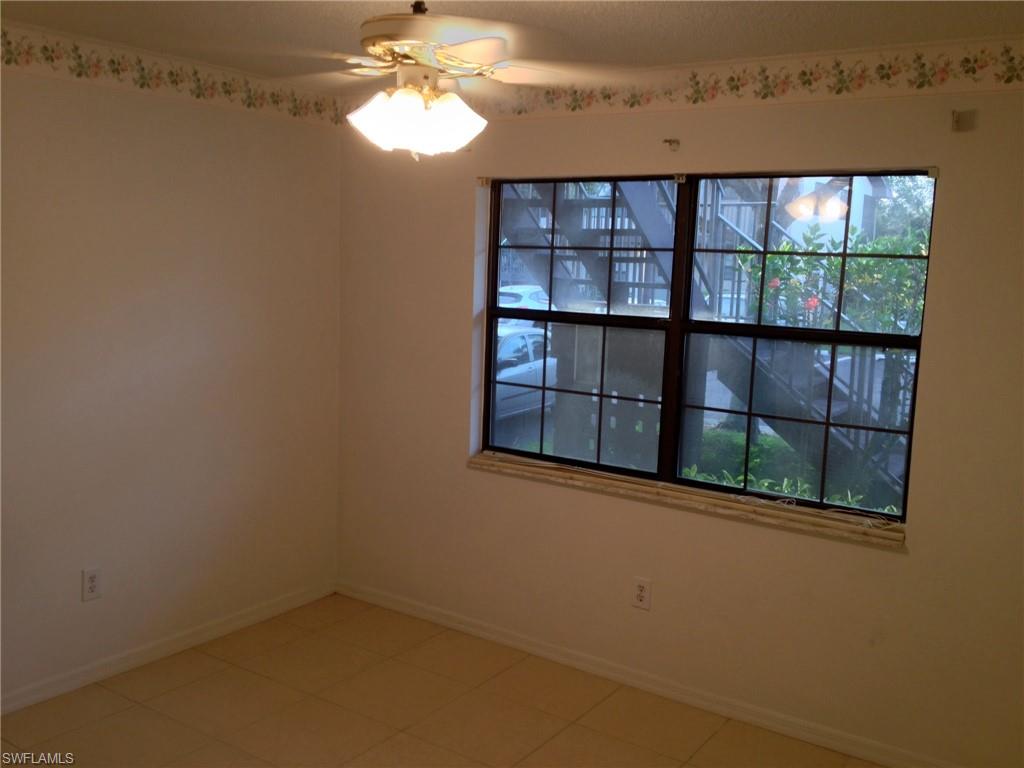 5339 Treetops Drive, Unit T105 Naples, FL 34113 - Photo 12 of 16 a view of a small space with a window