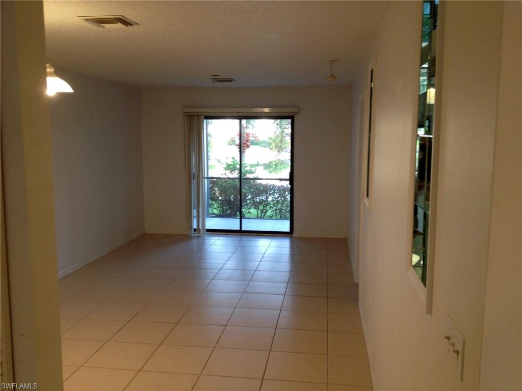 5339 Treetops Drive, Unit T105 Naples, FL 34113 - Photo 2 of 16 a view of hallway with window