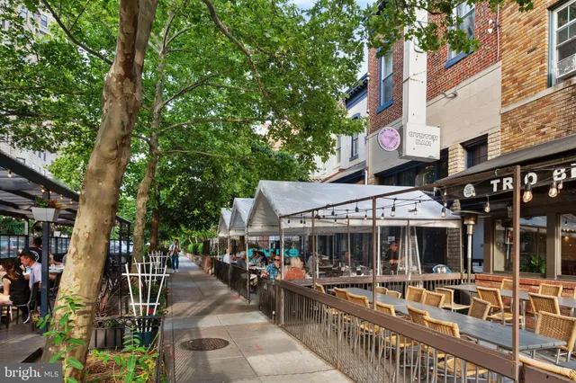 a view of a building with sitting area