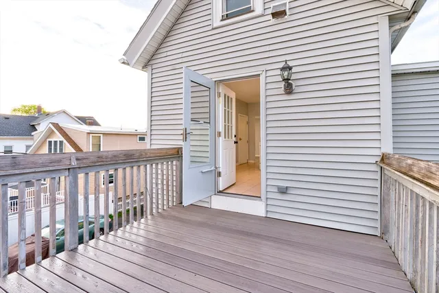 a kitchen with a stove sink and cabinets
