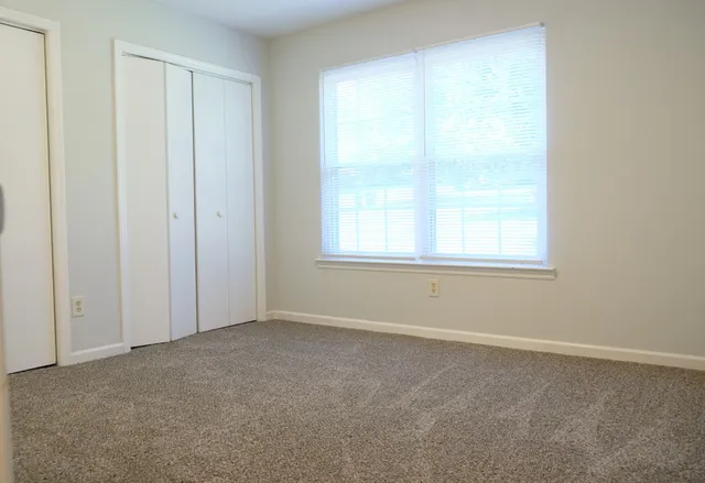 an empty room with a window