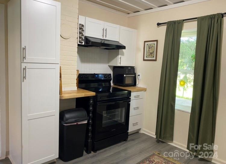 104 Riley Court Rutherfordton, NC 28139 - Photo 6 of 6 a kitchen with a refrigerator and a stove