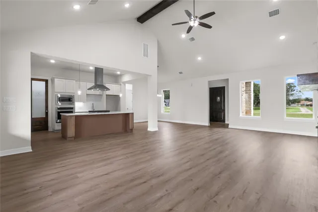 a view of kitchen with cabinets and stainless steel appliances