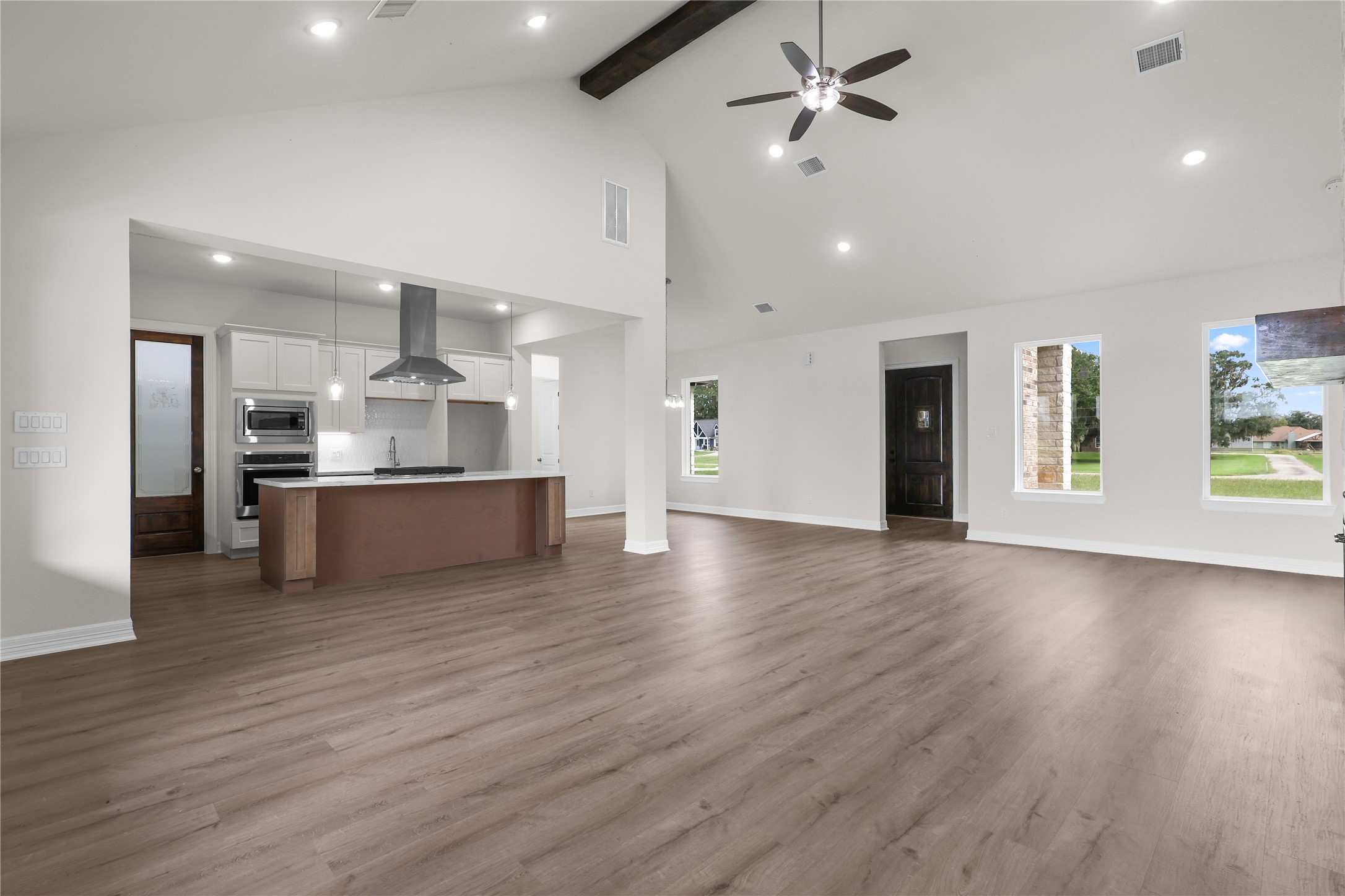 1720 Flintlock Court Angleton, TX 77515 - Photo 7 of 32 a view of kitchen with cabinets and stainless steel appliances