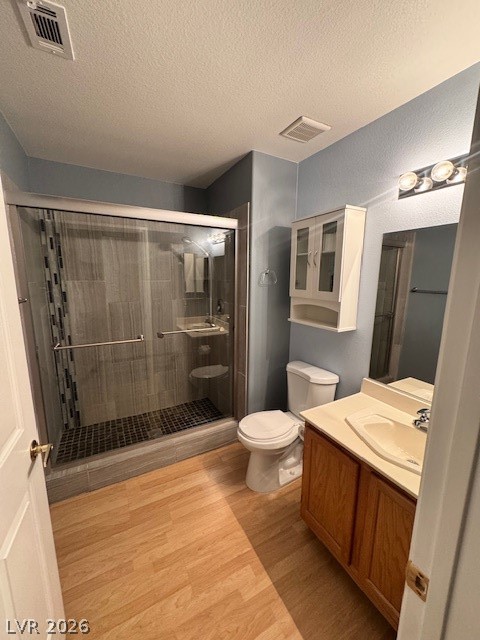 117 Tapatio Street Henderson, NV 89074 - Photo 7 of 14 This bathroom features a contemporary shower and a vanity for everyday convenience.