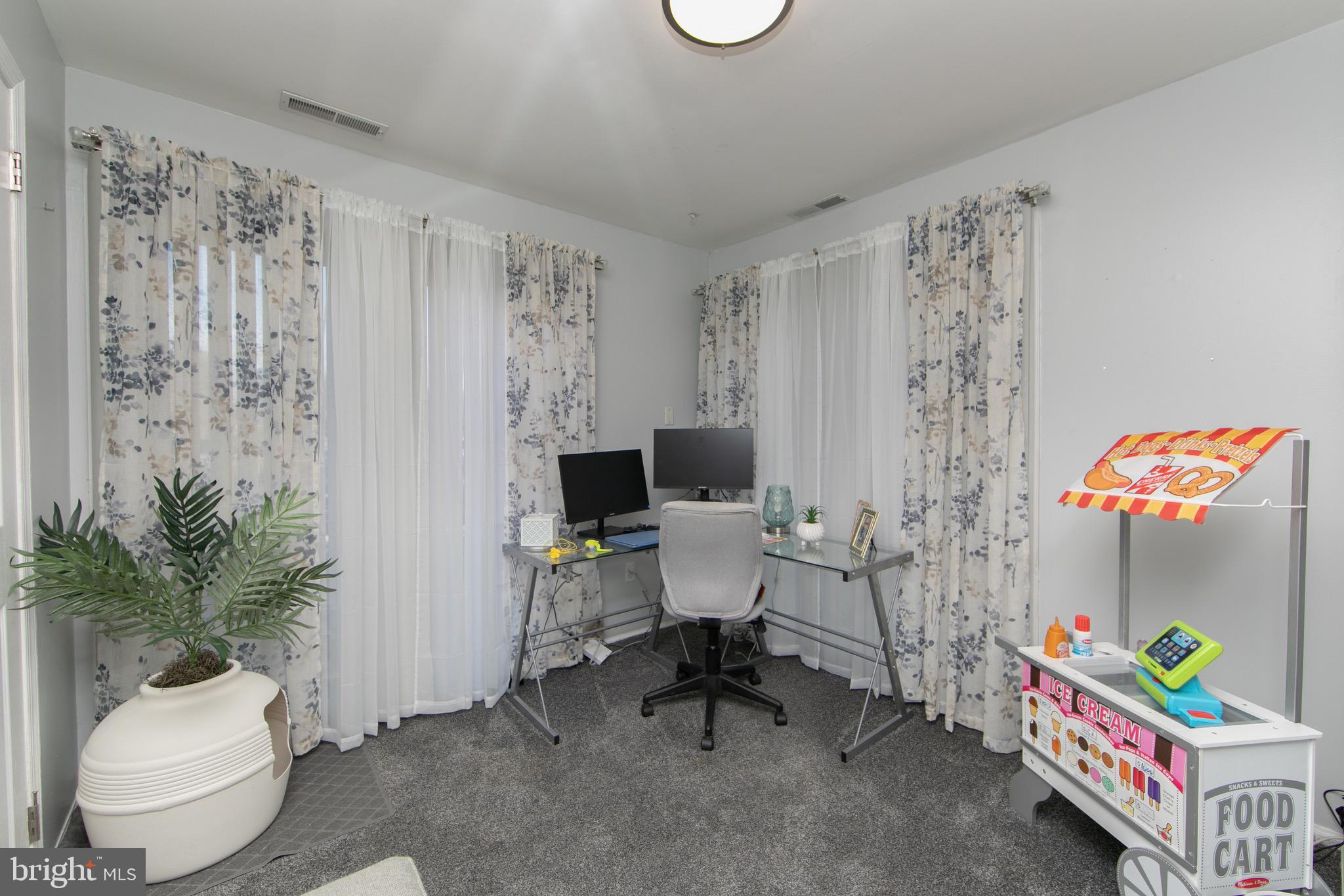 123 Birchfield Court Mount Laurel, NJ 08054 - Photo 14 of 32 a living room with furniture and a potted plant