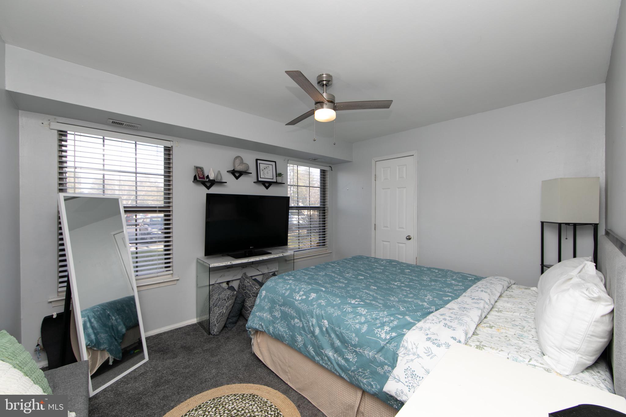 123 Birchfield Court Mount Laurel, NJ 08054 - Photo 21 of 32 a bedroom with a bed and a flat screen tv
