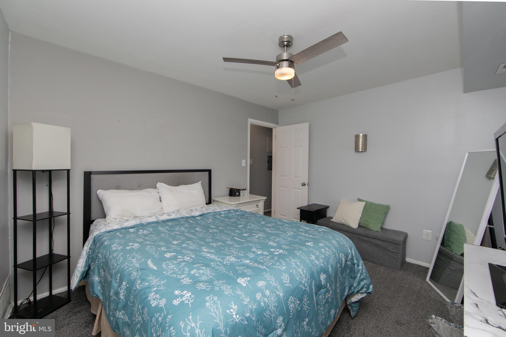 123 Birchfield Court Mount Laurel, NJ 08054 - Photo 23 of 32 a bedroom with a bed and a large mirror