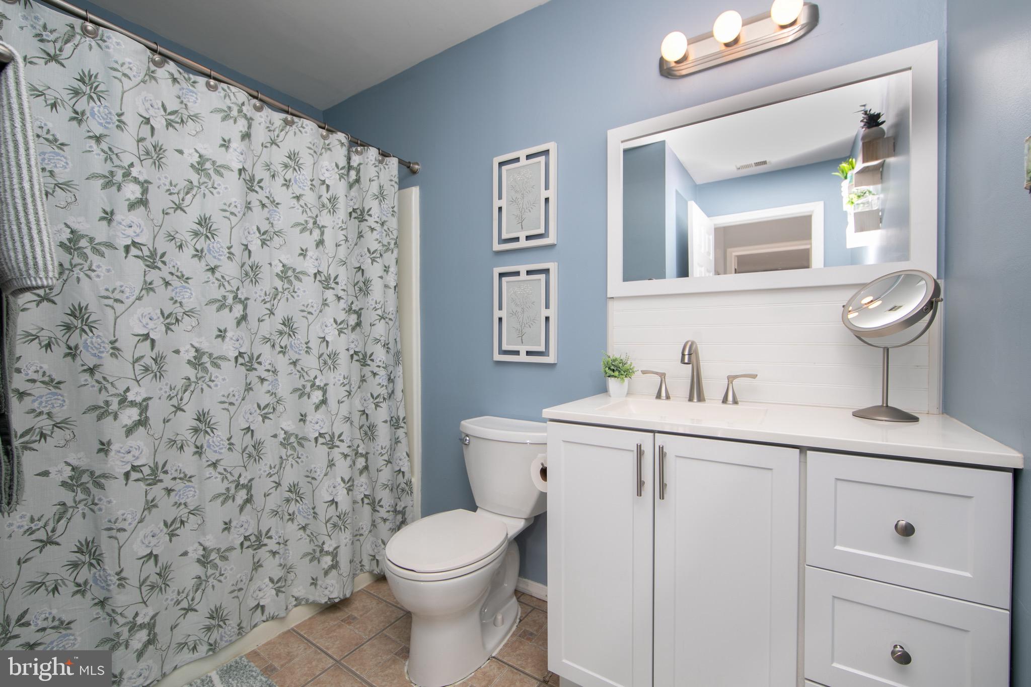 123 Birchfield Court Mount Laurel, NJ 08054 - Photo 24 of 32 a bathroom with a toilet sink and mirror