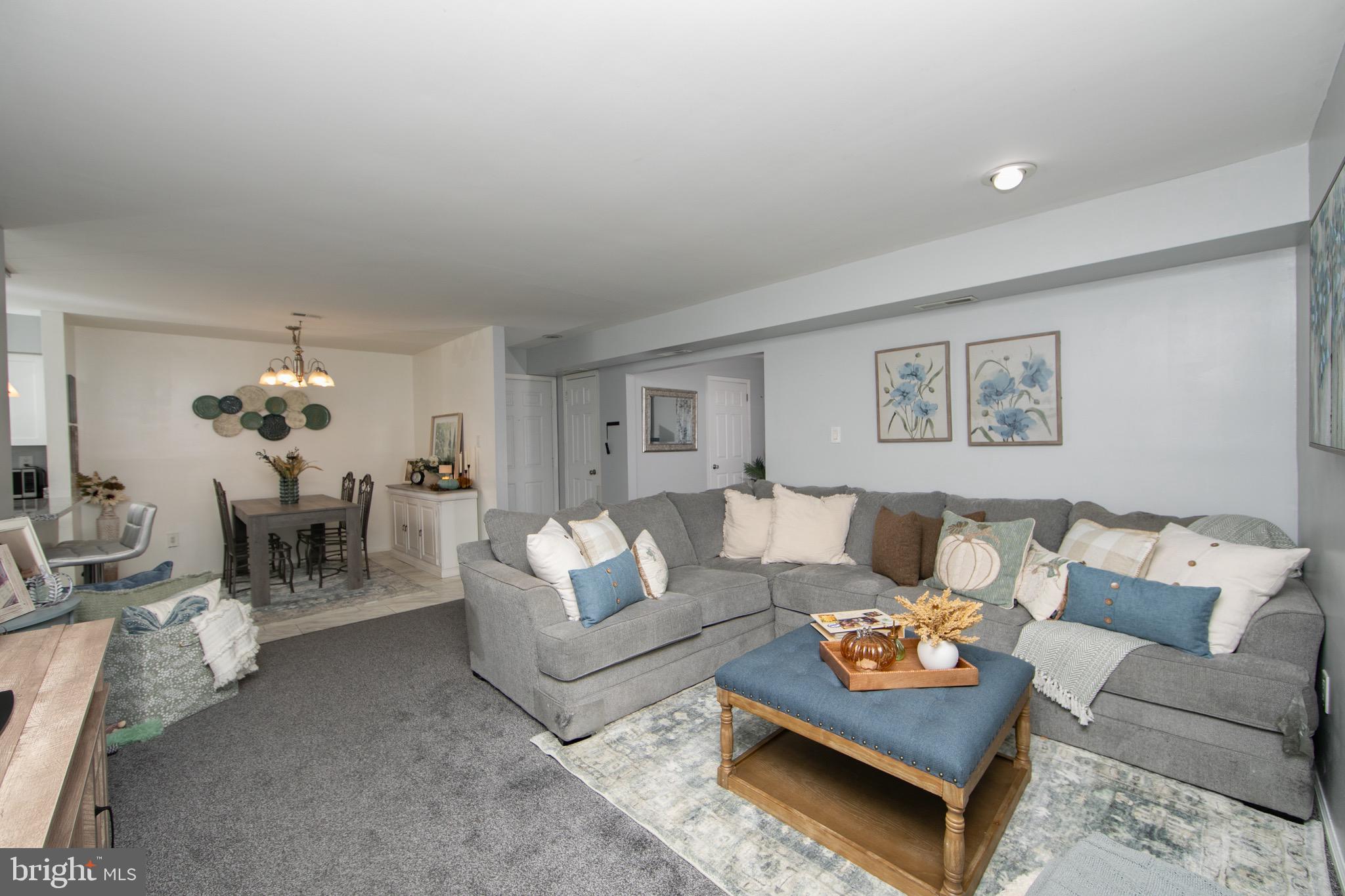 123 Birchfield Court Mount Laurel, NJ 08054 - Photo 4 of 32 a living room with furniture and a table