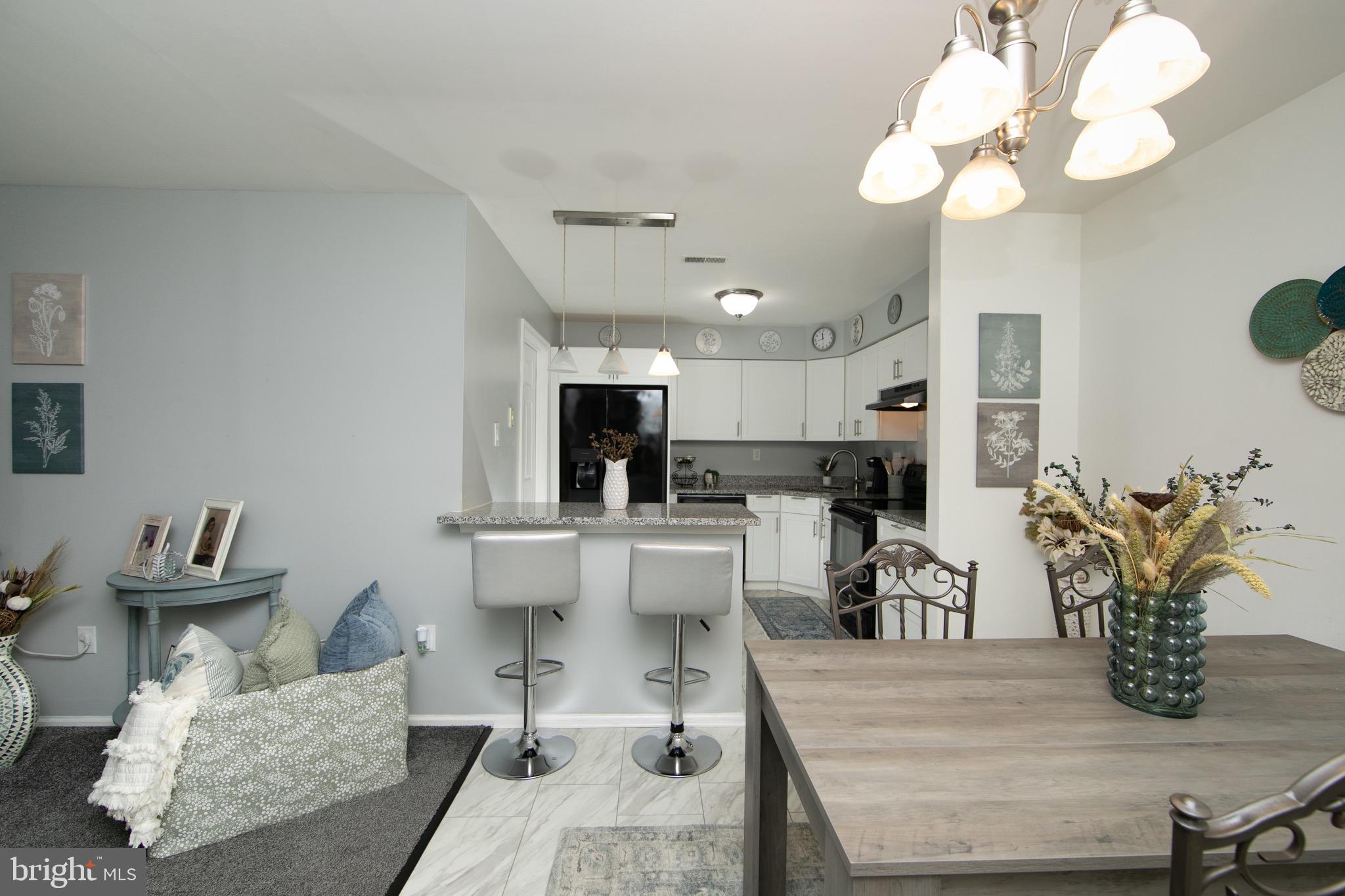 123 Birchfield Court Mount Laurel, NJ 08054 - Photo 8 of 32 a living room with furniture and view of kitchen