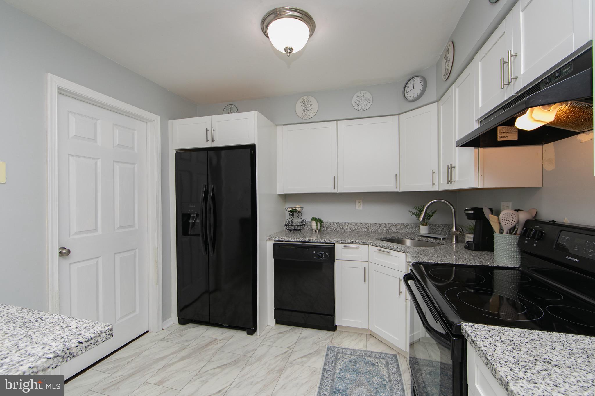 123 Birchfield Court Mount Laurel, NJ 08054 - Photo 10 of 32 a kitchen with granite countertop a refrigerator stove and sink