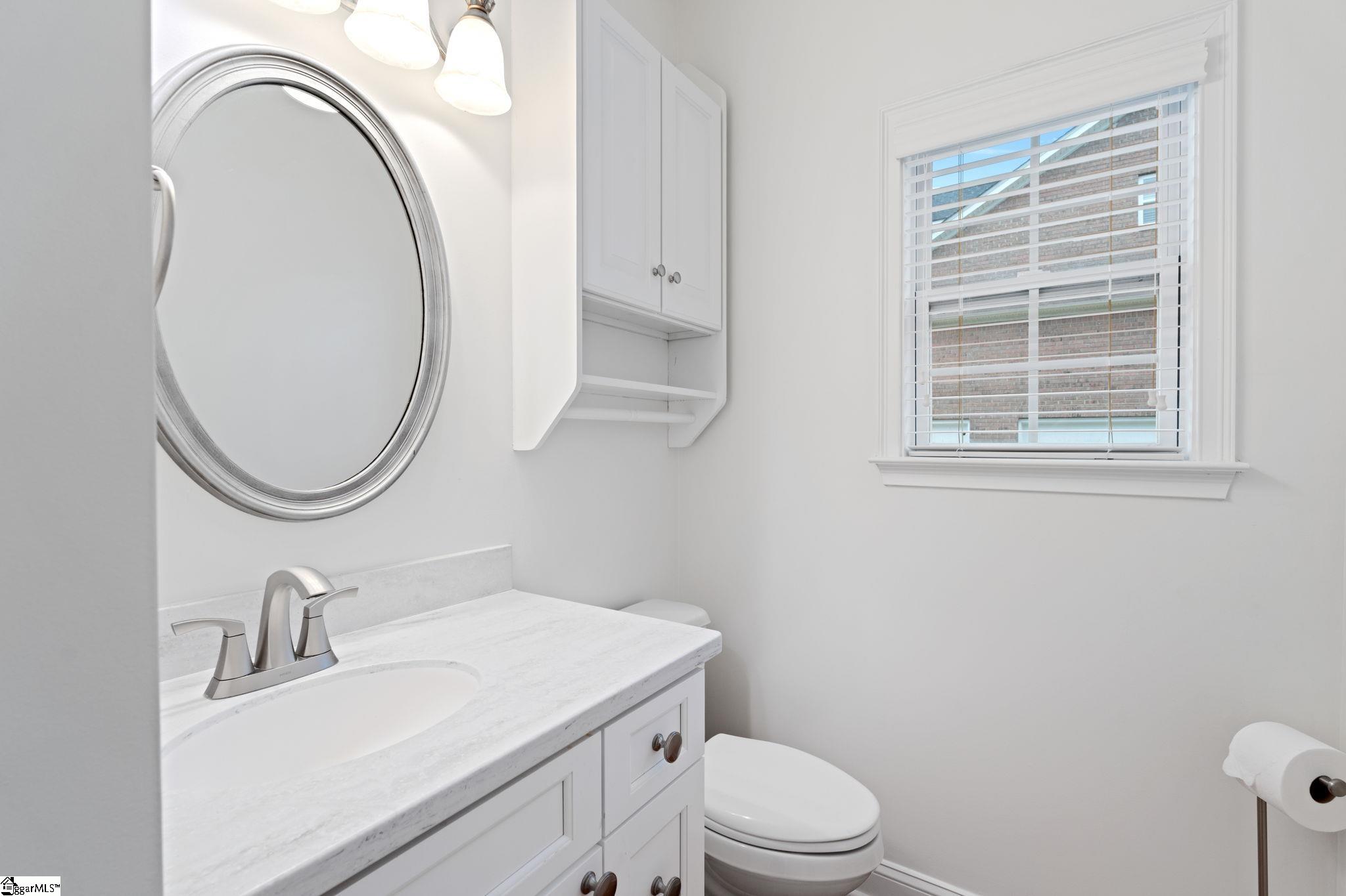 207 Traymore Way Greer, SC 29650 - Photo 20 of 49 This half bathroom is located near the flex room on first floor.