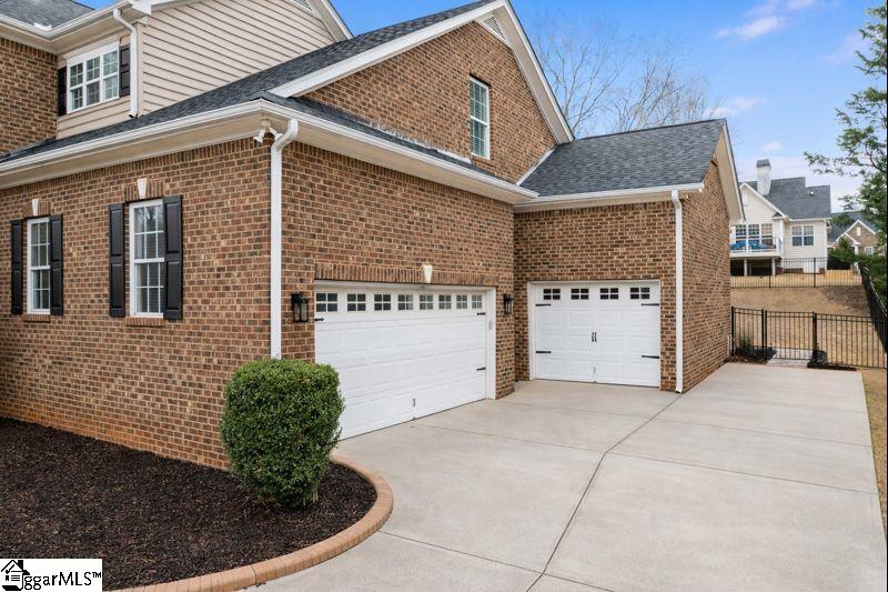 207 Traymore Way Greer, SC 29650 - Photo 43 of 49 The extra garage bay is perfect for storage or for a hobby area.