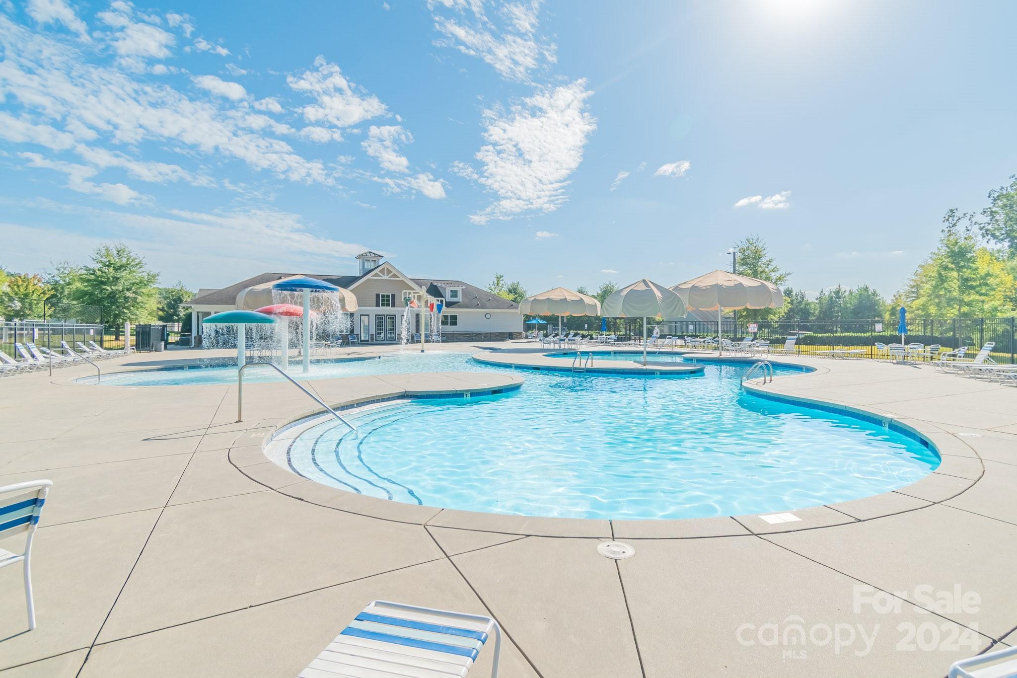 8715 Balsam Bay Road Charlotte, NC 28227 - Photo 25 of 29 a view of a swimming pool with a terrace