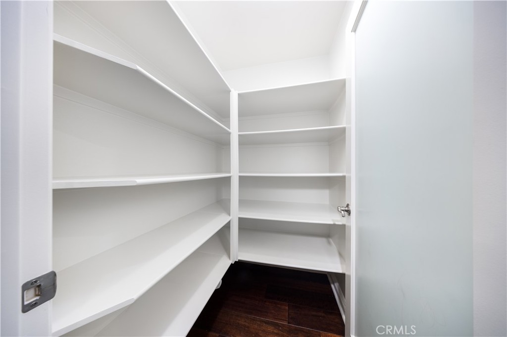 130 Yellow Daisy Irvine, CA 92618 - Photo 12 of 48 a view of walk in closet with empty racks