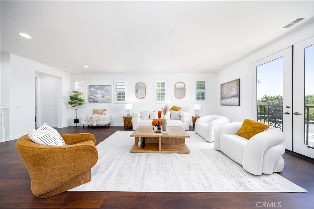 130 Yellow Daisy Irvine, CA 92618 - Photo 22 of 48 a living room with furniture and a large window