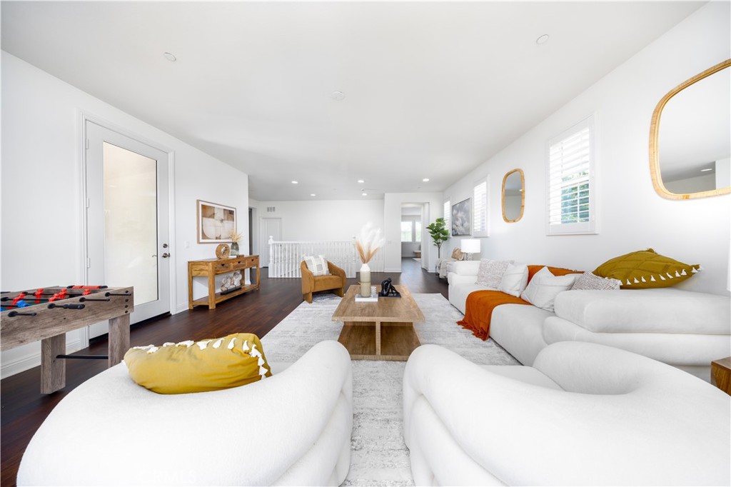 130 Yellow Daisy Irvine, CA 92618 - Photo 23 of 48 a living room with furniture and a large window