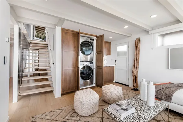 a kitchen with a sink cabinets and appliances