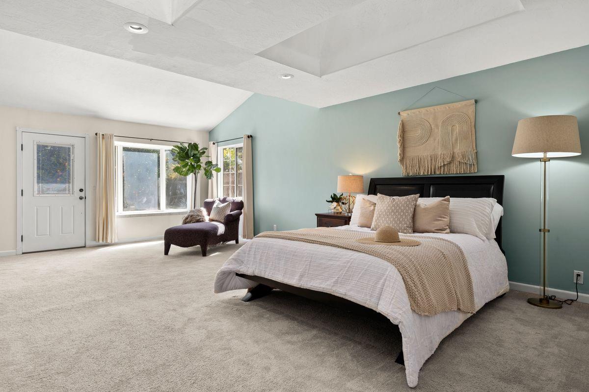 2230 South Rice Road Ojai, CA 93023 - Photo 12 of 26 a spacious bedroom with a bed and furniture