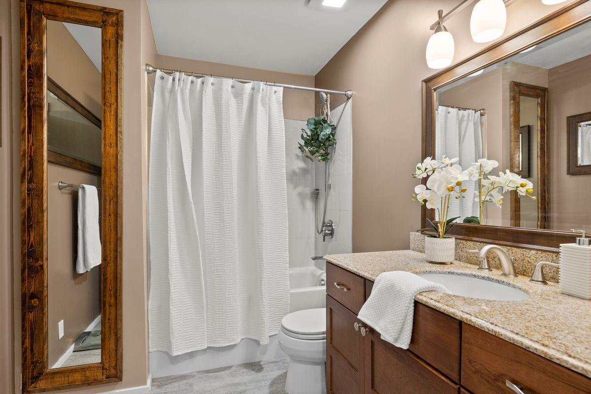 2230 South Rice Road Ojai, CA 93023 - Photo 17 of 26 a bathroom with a granite countertop sink and a mirror