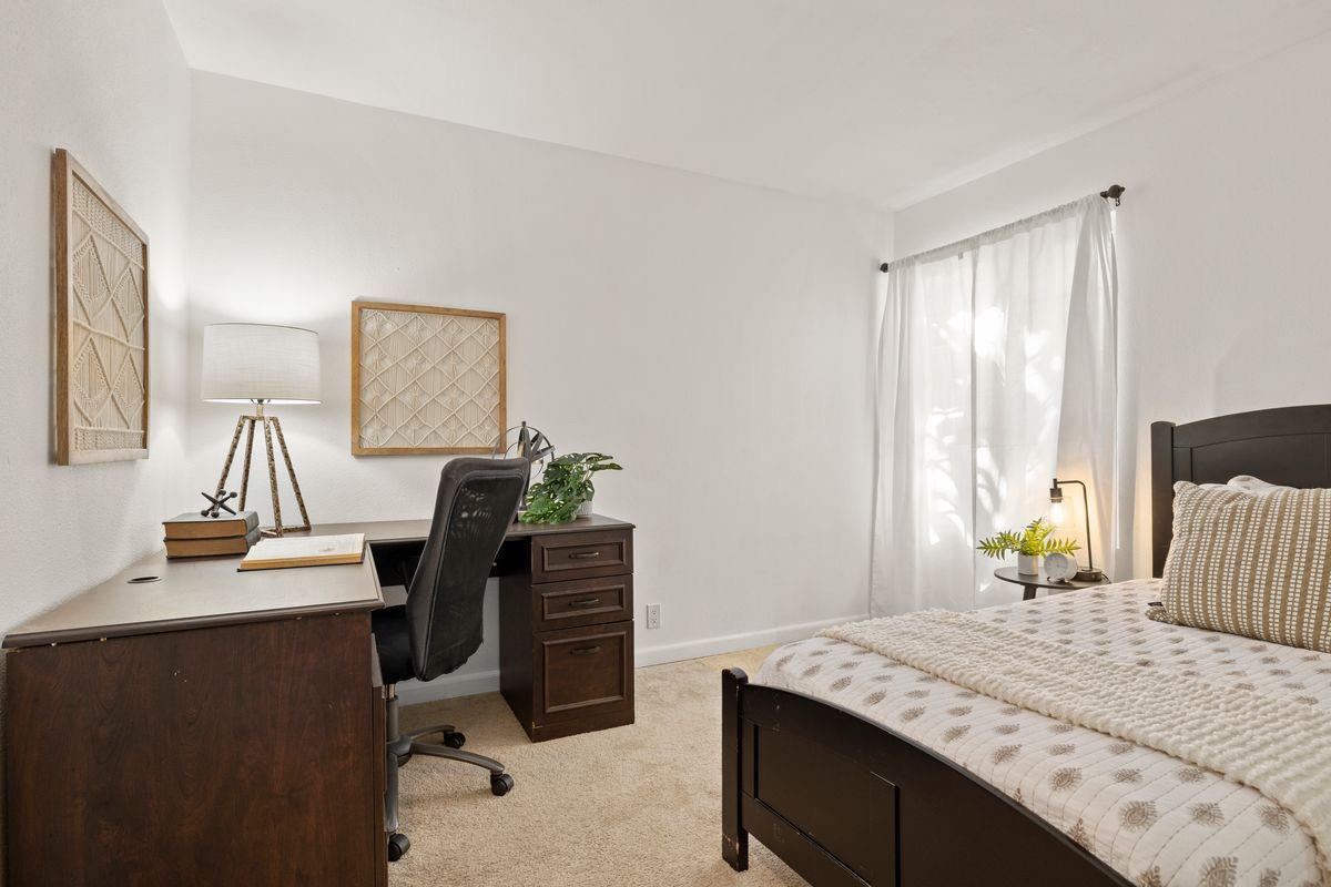 2230 South Rice Road Ojai, CA 93023 - Photo 18 of 26 a bedroom with a bed and a desk