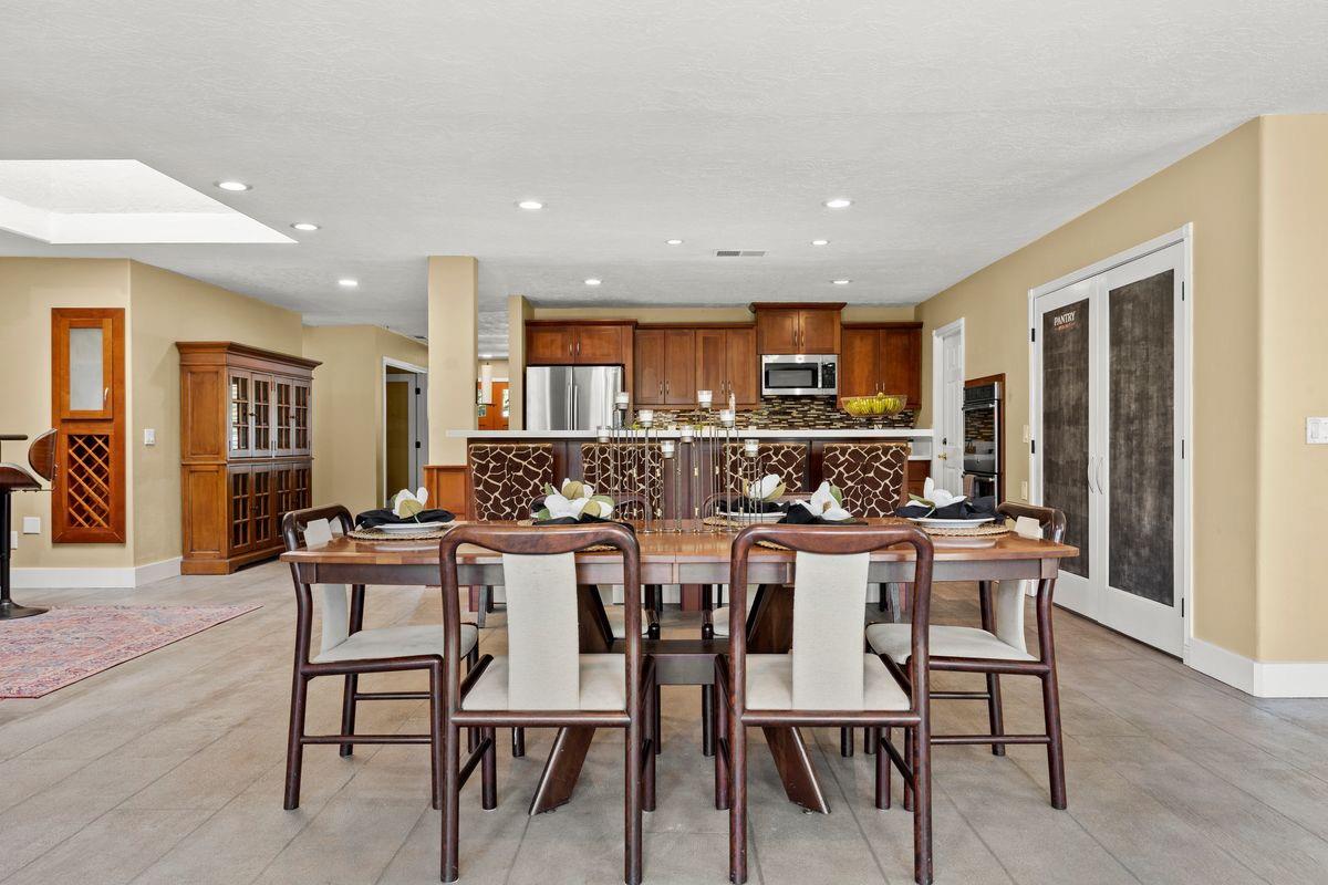 2230 South Rice Road Ojai, CA 93023 - Photo 6 of 26 a view of a dining area with furniture and wooden floor