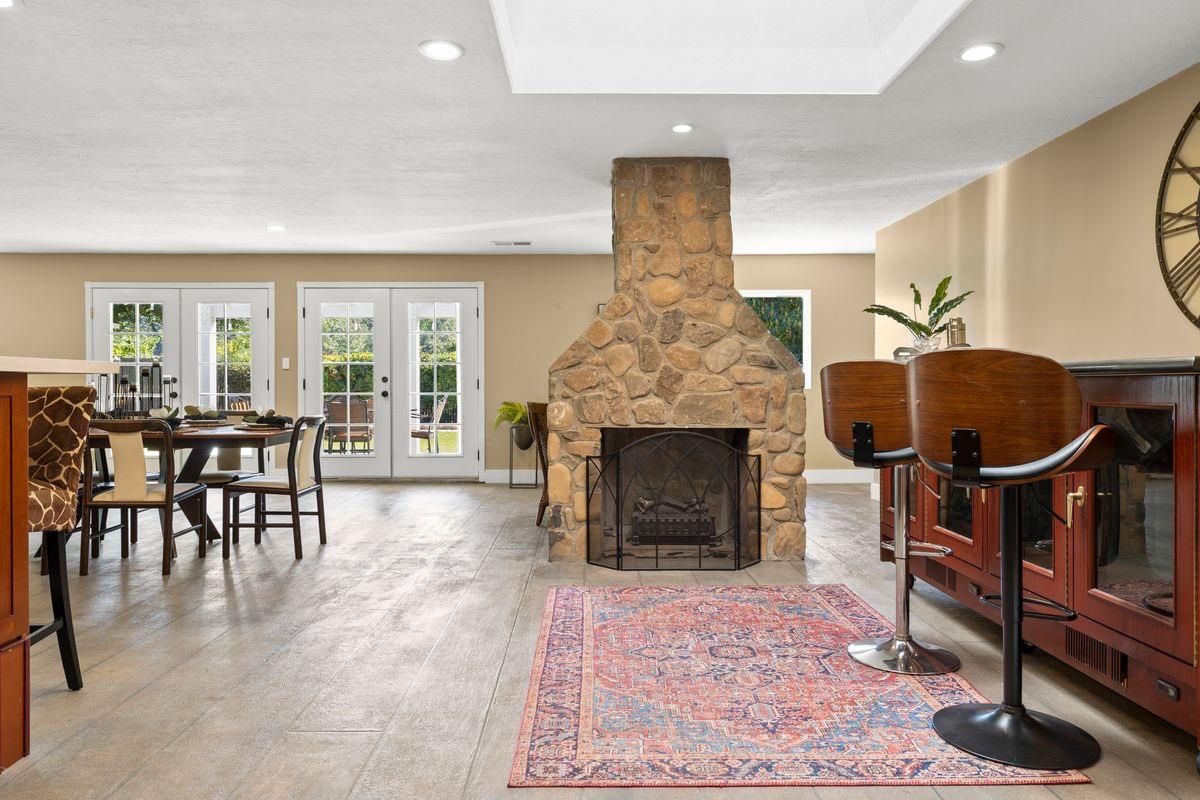 2230 South Rice Road Ojai, CA 93023 - Photo 7 of 26 a living room with furniture and a fireplace
