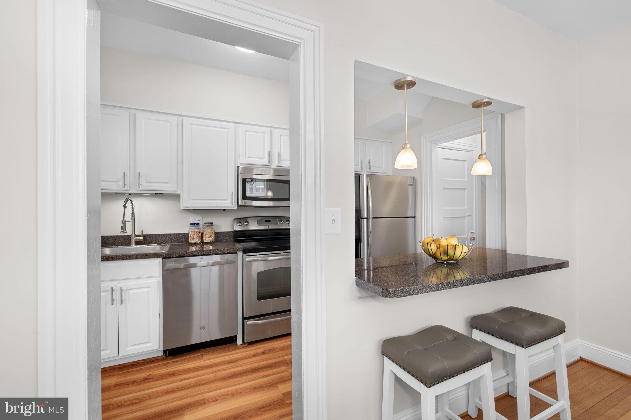 3810 Beecher Street Northwest Washington, DC 20007 - Photo 9 of 40 Kitchen with Breakfast Bar