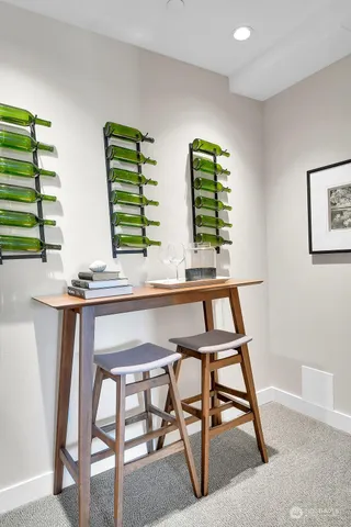 a spacious bathroom with double sink and a mirror