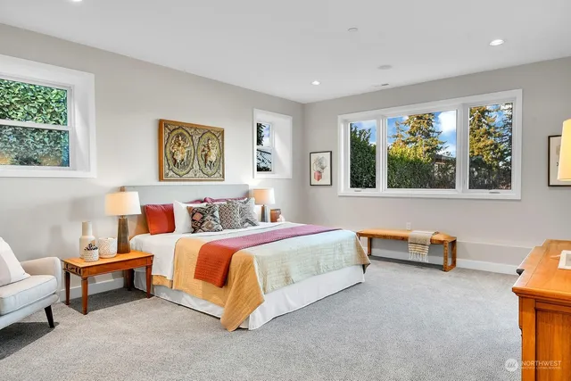 a bathroom with a tub and shower