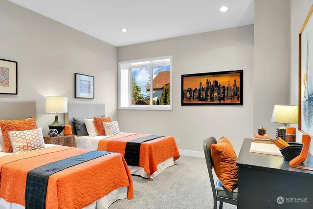 a kitchen with stainless steel appliances a sink and a stove