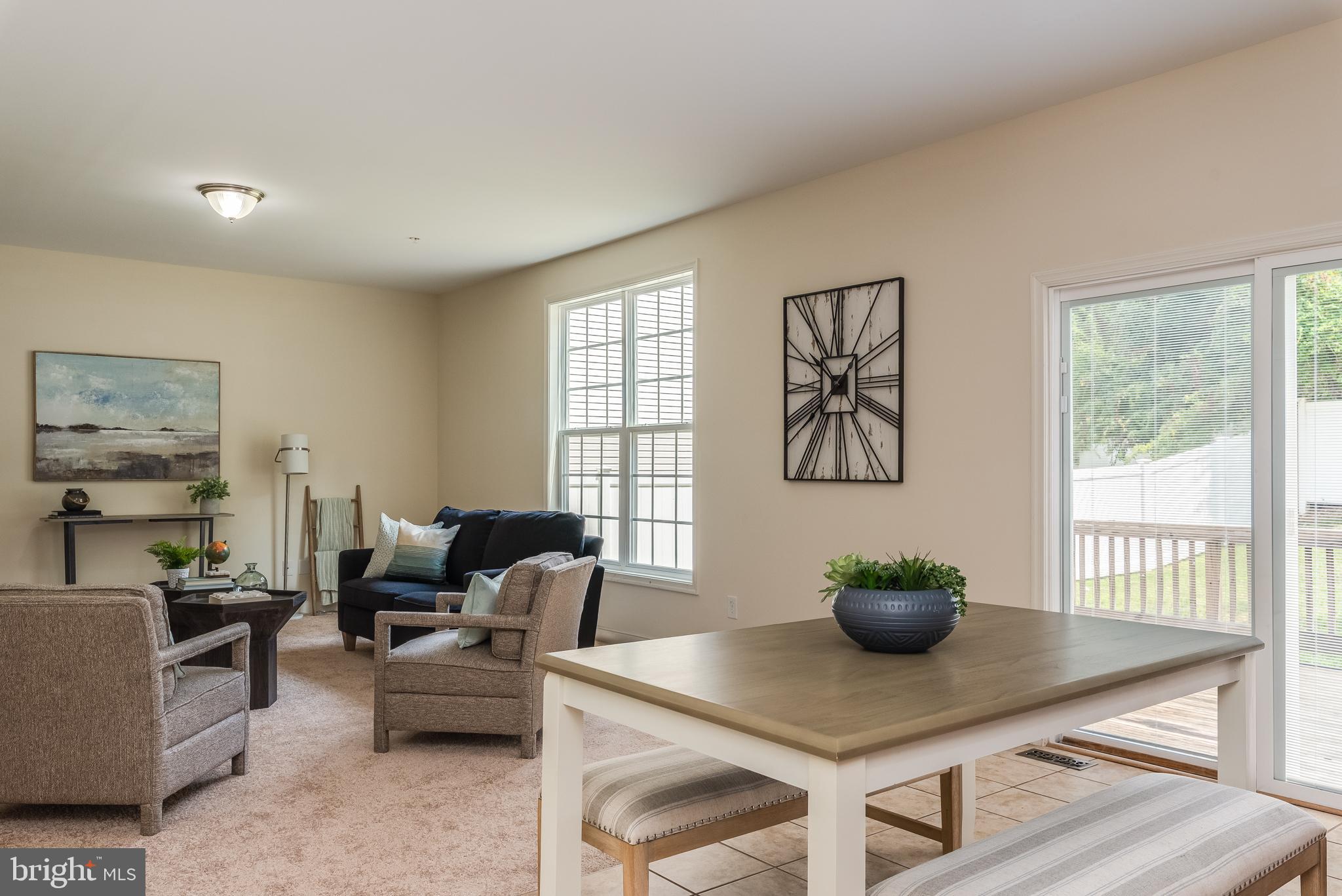 337 Chestnut Road Linthicum Heights, MD 21090 - Photo 25 of 64 a view of a dining room with furniture and a potted plant