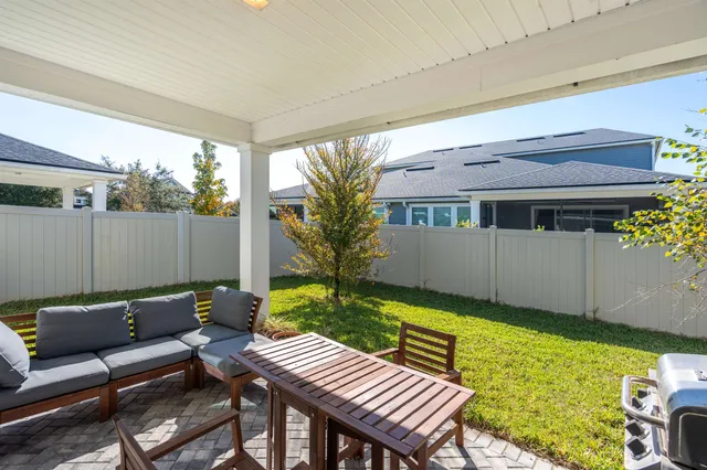 a outdoor living space with furniture and a garden