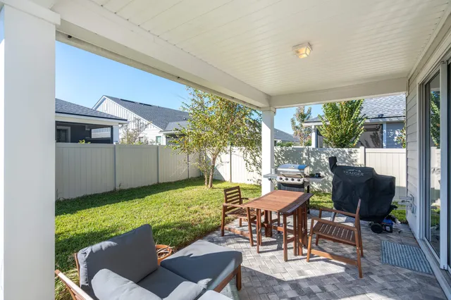 a outdoor living space with furniture and garden view
