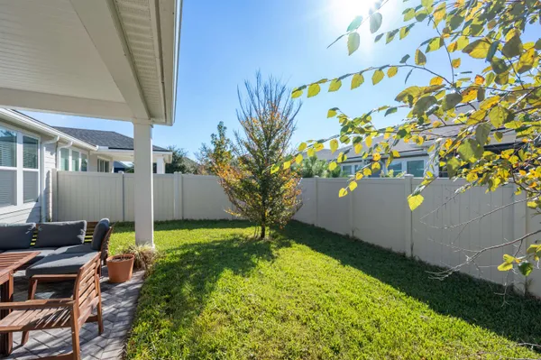 a vase of flowers sitting on a table