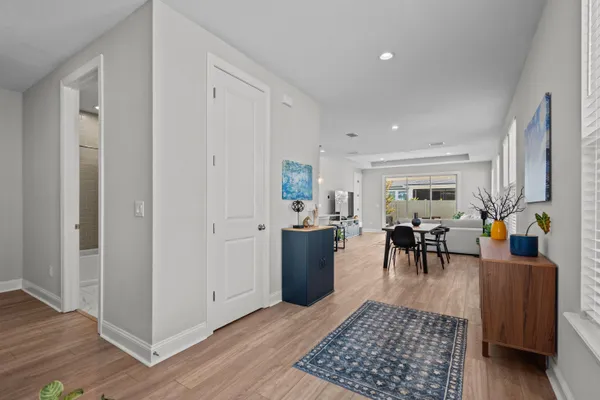 a living room with furniture and a table