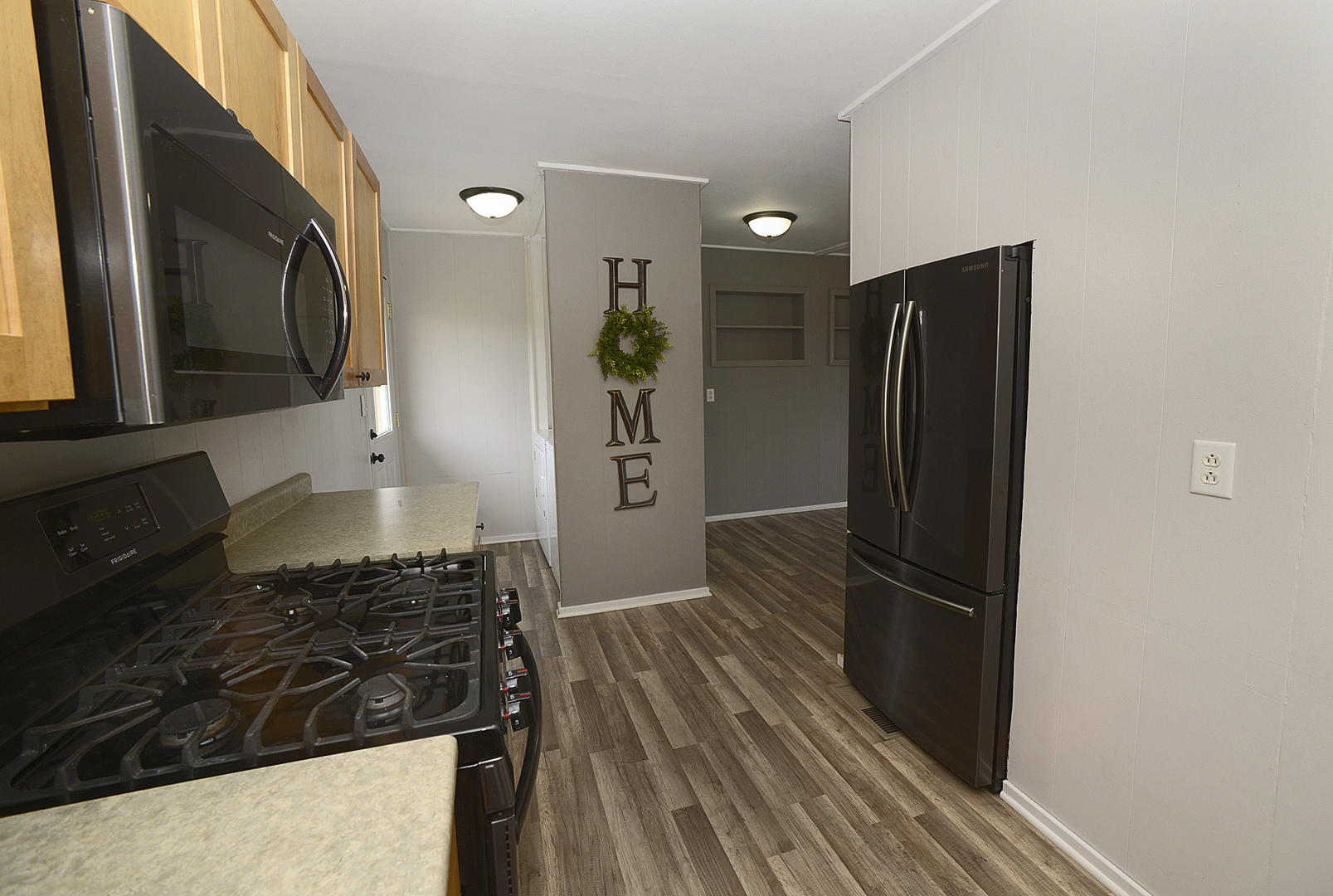 736 Westwood Drive Ottawa, IL 61350 - Photo 5 of 15 a kitchen with a refrigerator and a stove