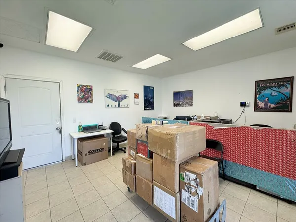 a room with furniture and a window