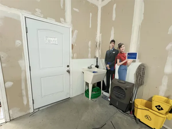 a bathroom with a toilet and a sink