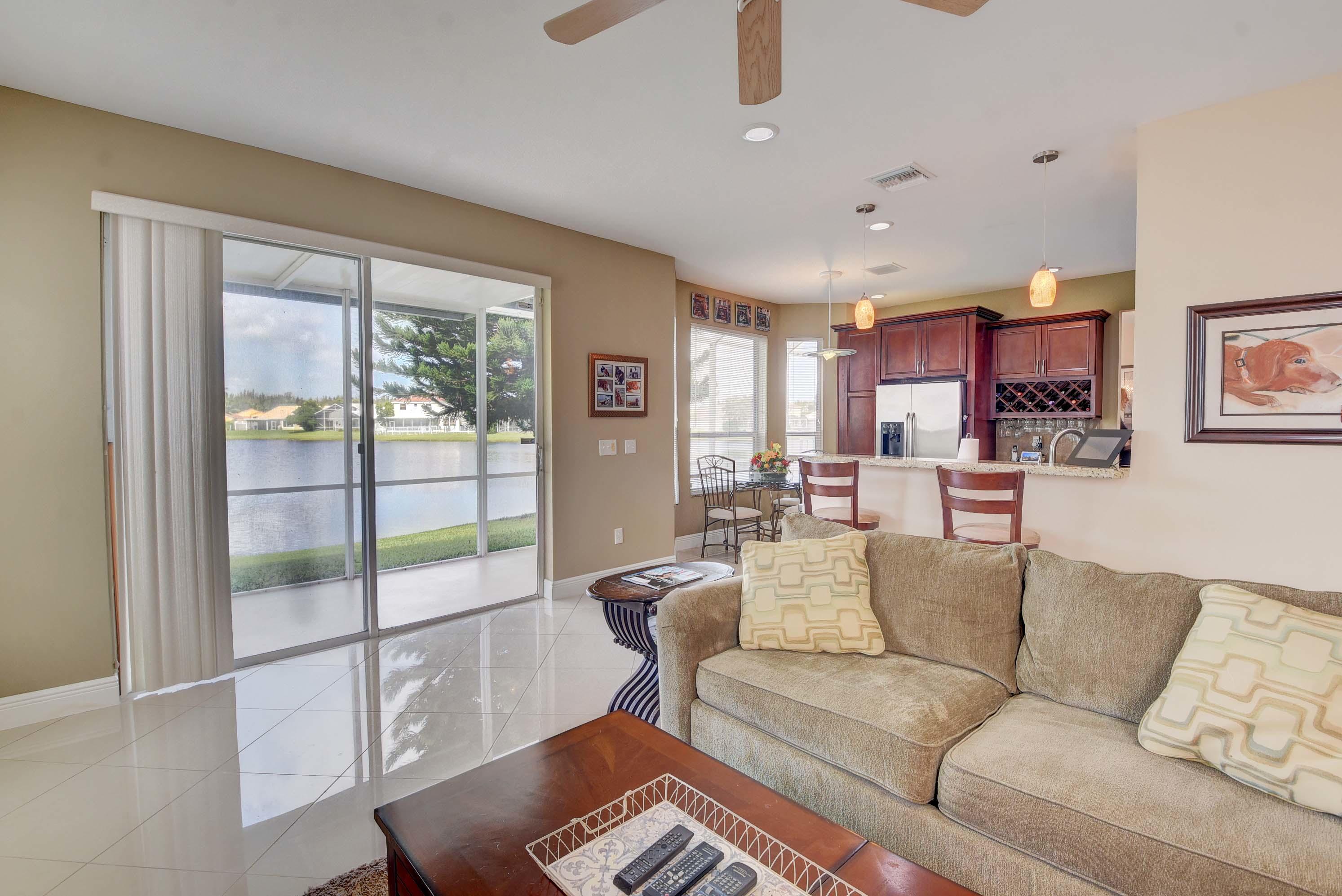 9593 Tavernier Drive Boca Raton, FL 33496 - Photo 9 of 32 Living Room Kitchen